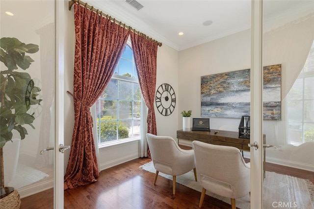 office space with hardwood / wood-style flooring, crown molding, and french doors