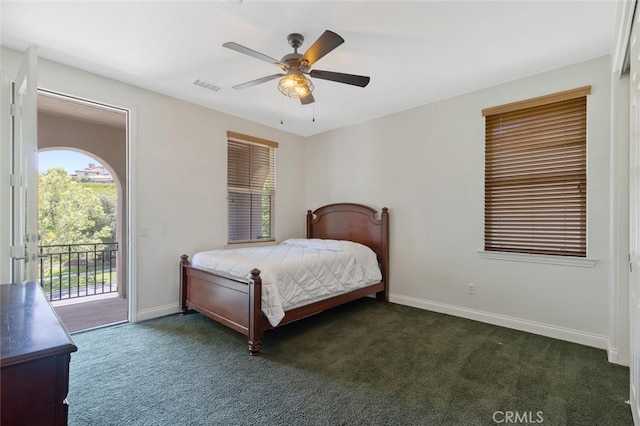 carpeted bedroom featuring access to exterior and ceiling fan