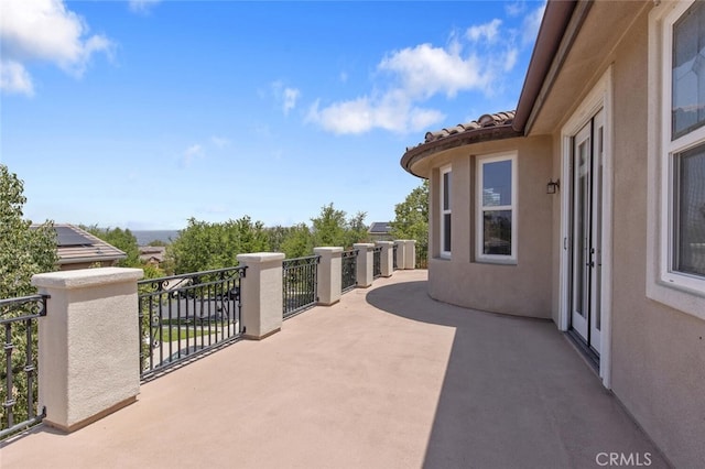 view of patio / terrace with a balcony