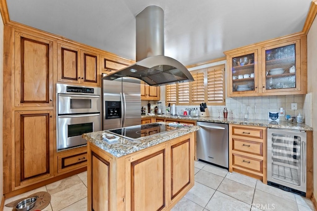 kitchen with a center island, wine cooler, light stone countertops, appliances with stainless steel finishes, and island exhaust hood