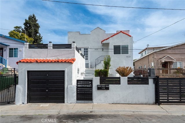 view of front of property featuring a garage