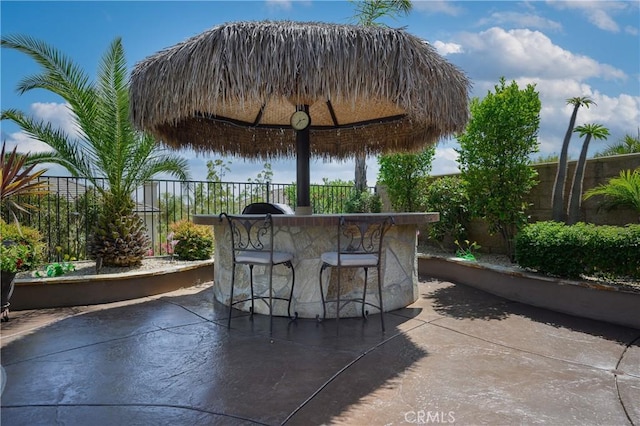 view of patio / terrace with exterior bar