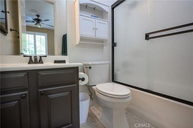 full bathroom featuring tile patterned floors, vanity, ceiling fan, shower / bath combination with glass door, and toilet