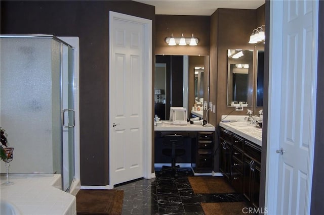 bathroom featuring vanity and a shower with shower door