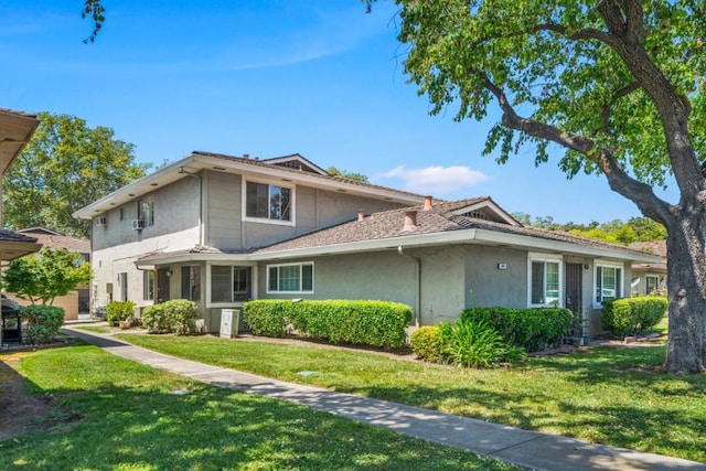 view of front of home with a front yard