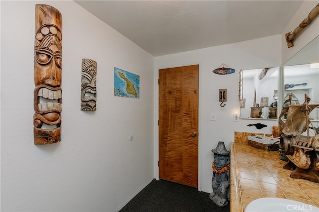 interior space with light tile patterned floors