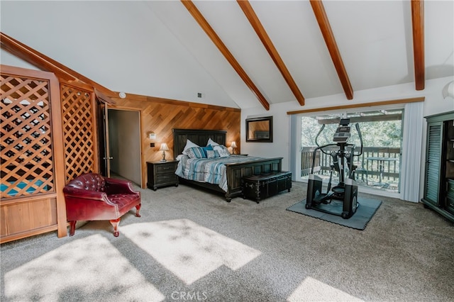 carpeted bedroom featuring beamed ceiling, wooden walls, and high vaulted ceiling