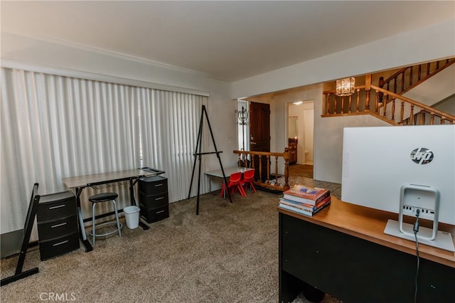 home office featuring an inviting chandelier and carpet flooring