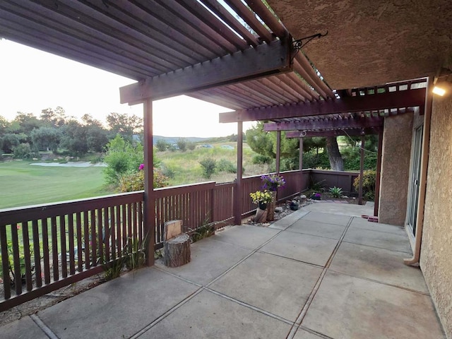 view of patio featuring a pergola