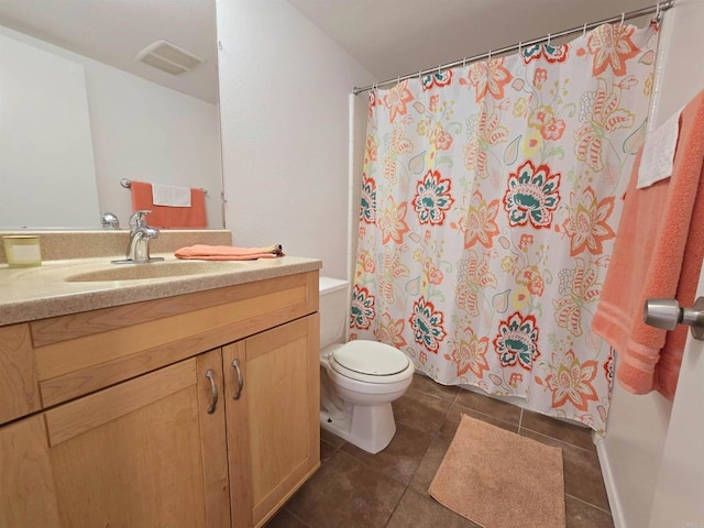 bathroom featuring toilet, tile patterned flooring, a shower with curtain, and vanity