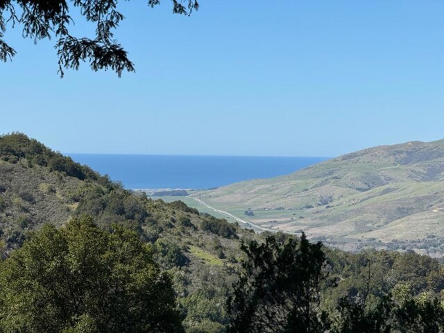 mountain view with a water view