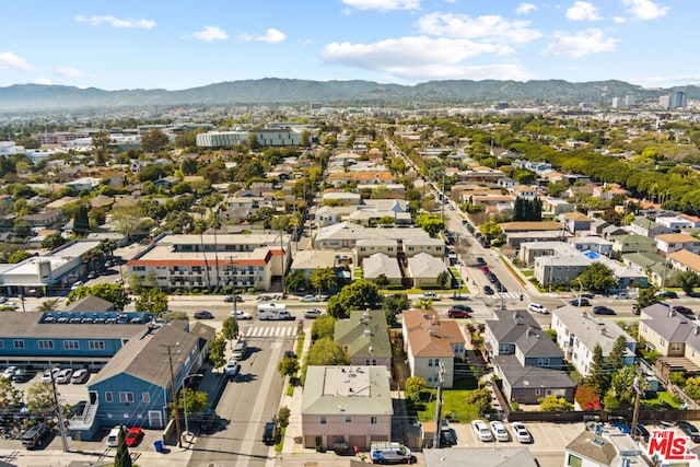 drone / aerial view featuring a mountain view