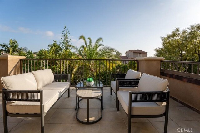 balcony featuring an outdoor hangout area and a patio