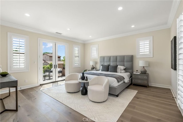 bedroom featuring access to exterior, wood finished floors, visible vents, and ornamental molding