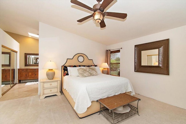 carpeted bedroom featuring a closet and ceiling fan