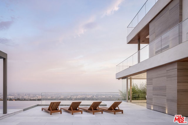 view of home's community with a patio