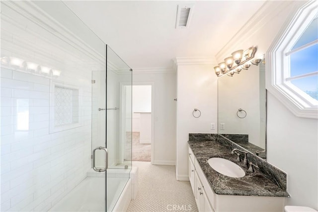 bathroom with tile patterned flooring, vanity, and ornamental molding