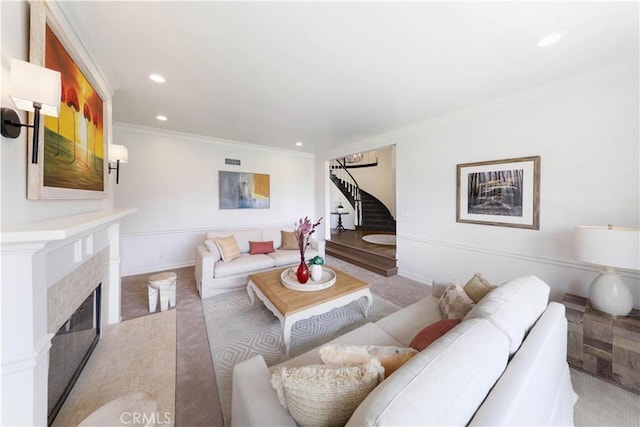 living room with ornamental molding