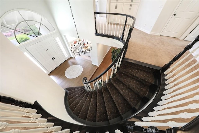 staircase featuring hardwood / wood-style floors