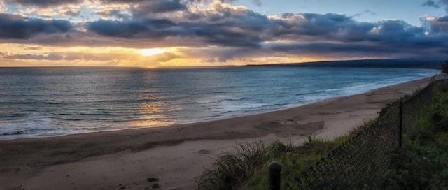 property view of water featuring a beach view