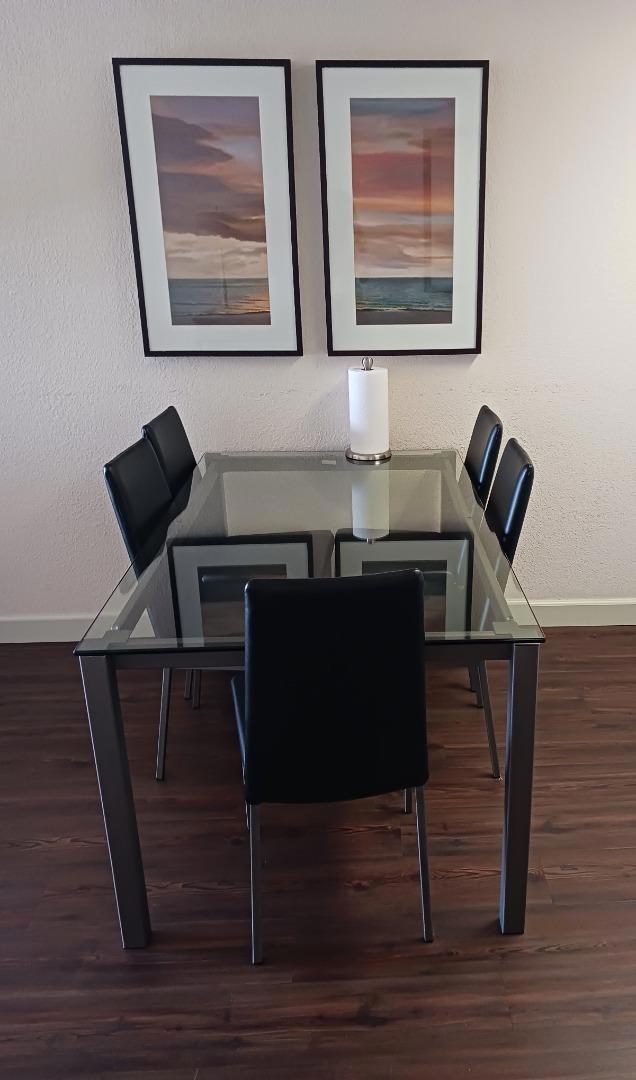 dining room with dark wood-type flooring