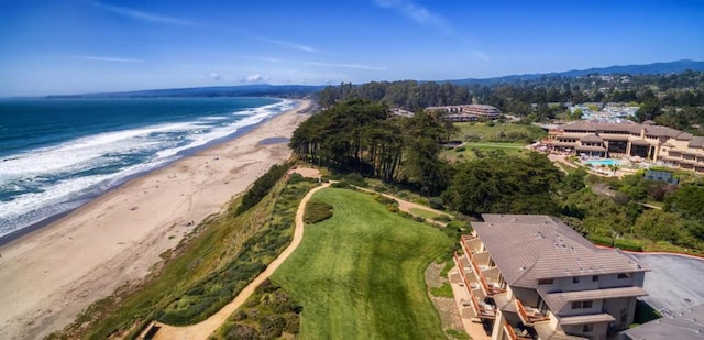 aerial view with a view of the beach and a water view