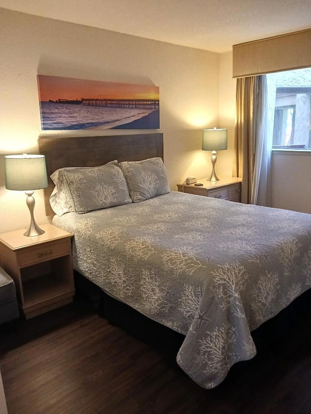 bedroom featuring hardwood / wood-style floors