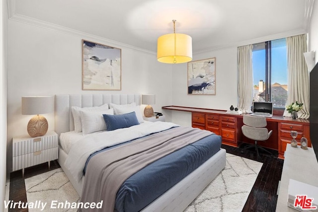 bedroom featuring dark hardwood / wood-style flooring and ornamental molding