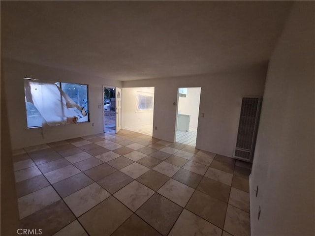 view of tiled spare room