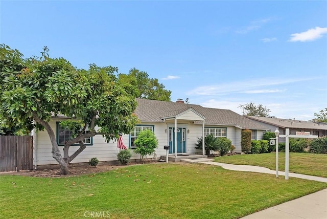 ranch-style house with a front yard