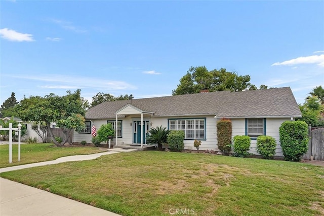 single story home featuring a front yard