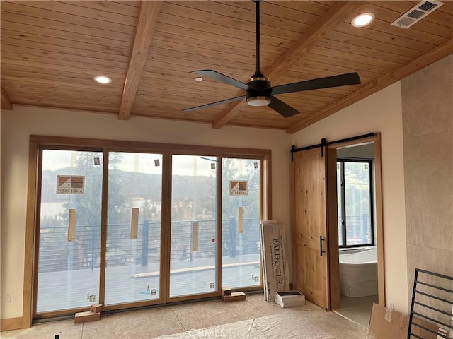 doorway with a barn door, vaulted ceiling with beams, wood ceiling, and plenty of natural light