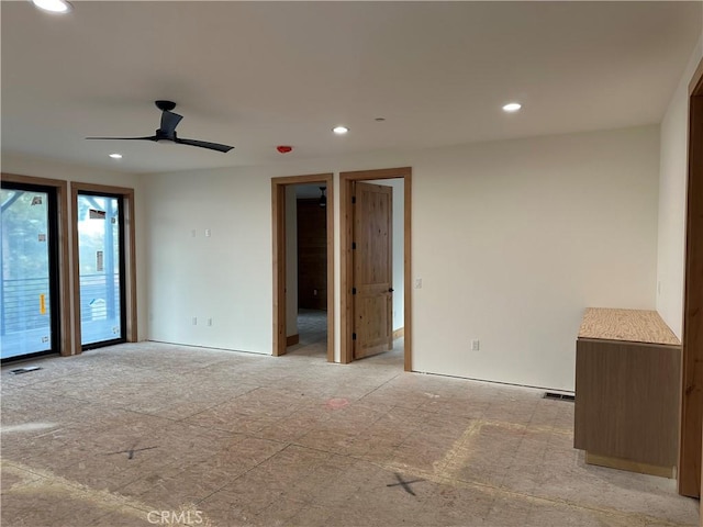 unfurnished room featuring ceiling fan