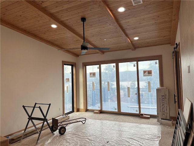 interior space featuring a barn door, vaulted ceiling with beams, wood ceiling, and ceiling fan