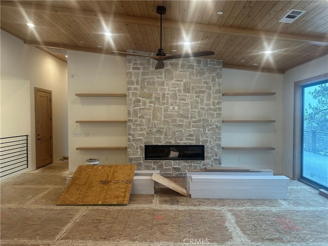 unfurnished living room with beamed ceiling, ceiling fan, wood ceiling, and a fireplace