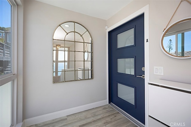 foyer with light hardwood / wood-style flooring