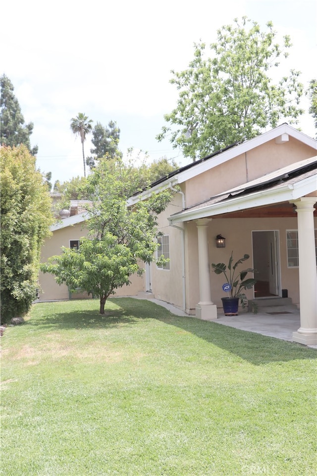 view of yard with a patio area