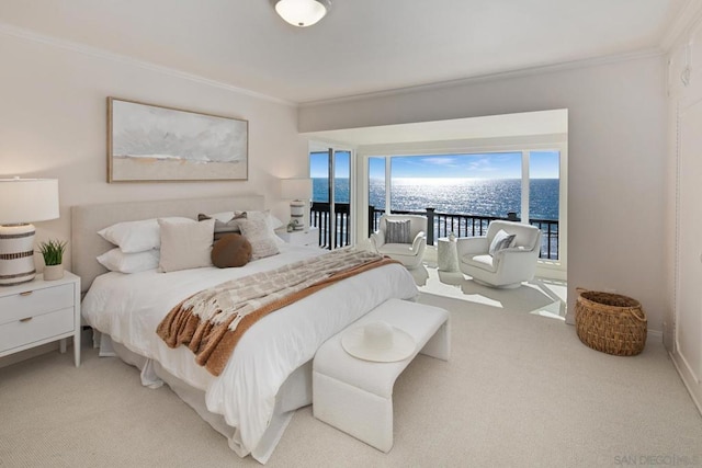 carpeted bedroom with crown molding and a water view