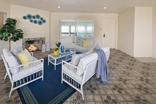 living room featuring a fireplace