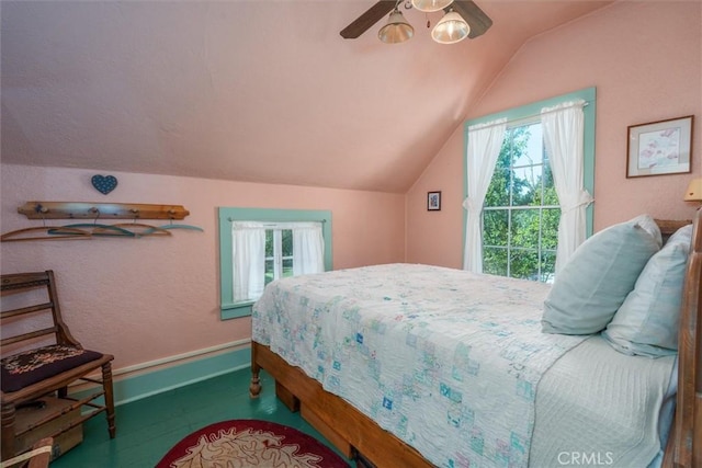 bedroom featuring vaulted ceiling and ceiling fan