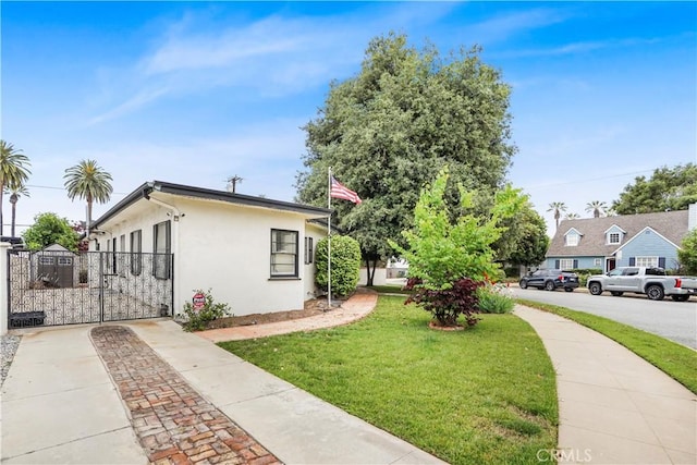 view of home's exterior with a yard