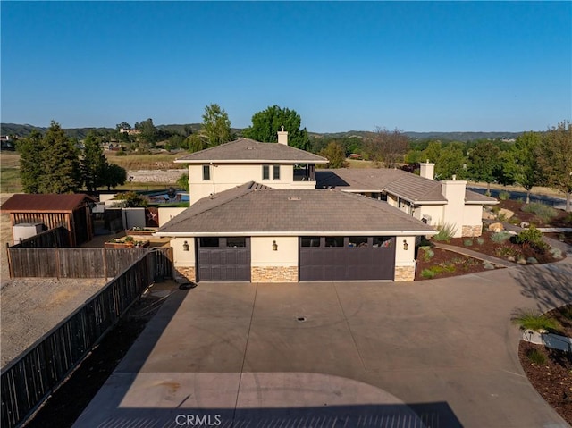 view of front of property featuring a garage