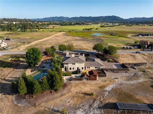 aerial view with a mountain view and a rural view