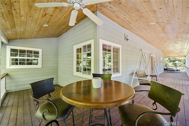 wooden deck with ceiling fan