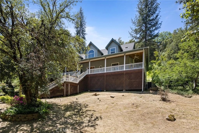 view of front of home with ceiling fan and covered porch