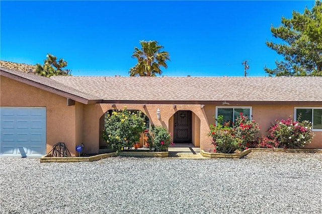 ranch-style house with a garage