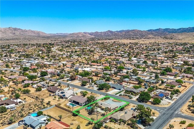 bird's eye view with a mountain view