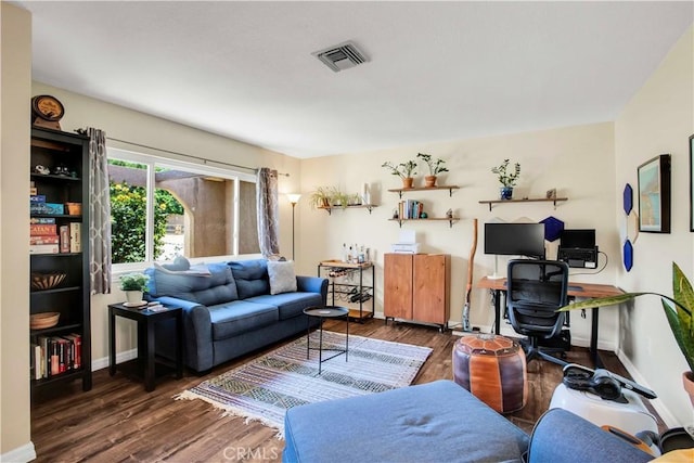 living room featuring dark hardwood / wood-style floors