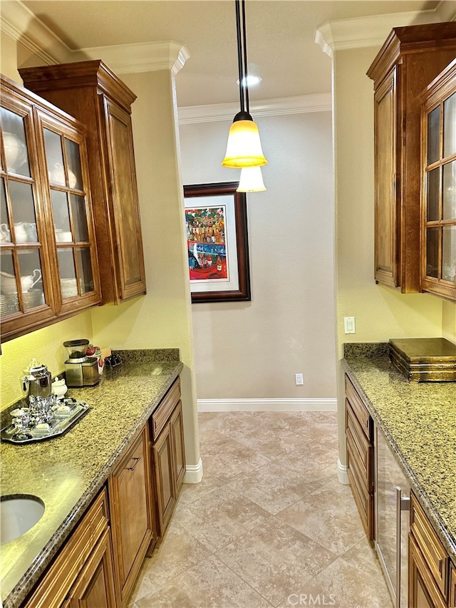 kitchen featuring ornamental molding, light tile flooring, decorative light fixtures, and stone countertops