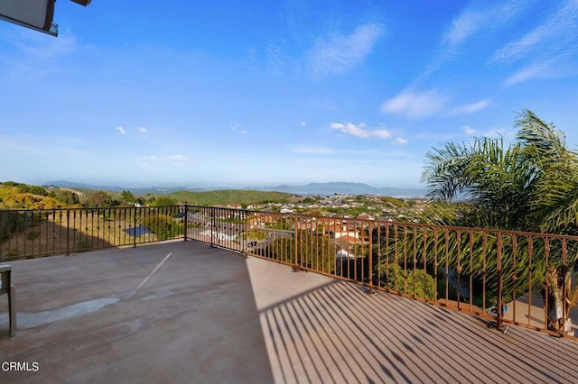 view of patio / terrace with a mountain view